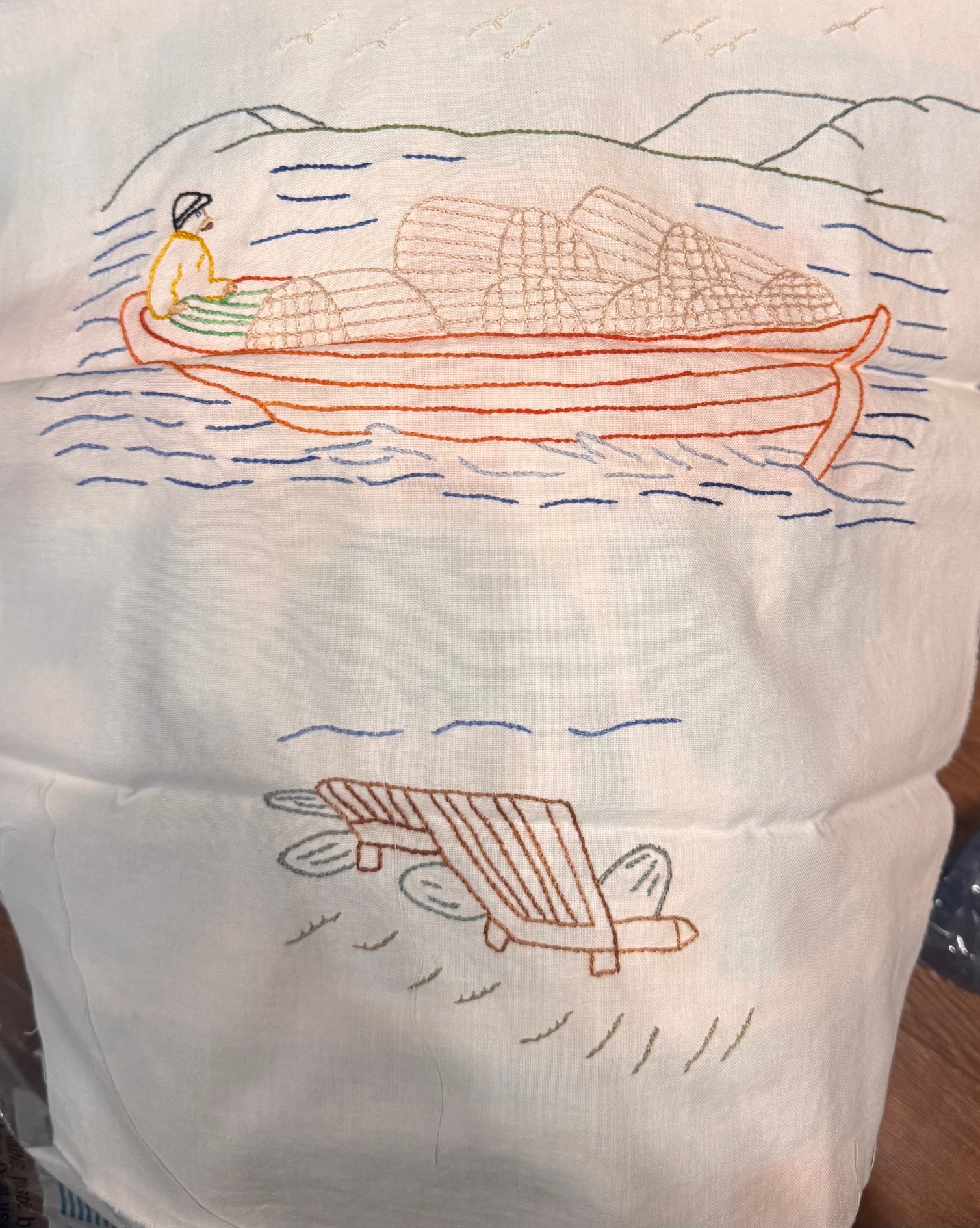 One of my grandmother's hand embroidered Newfoundland scenes